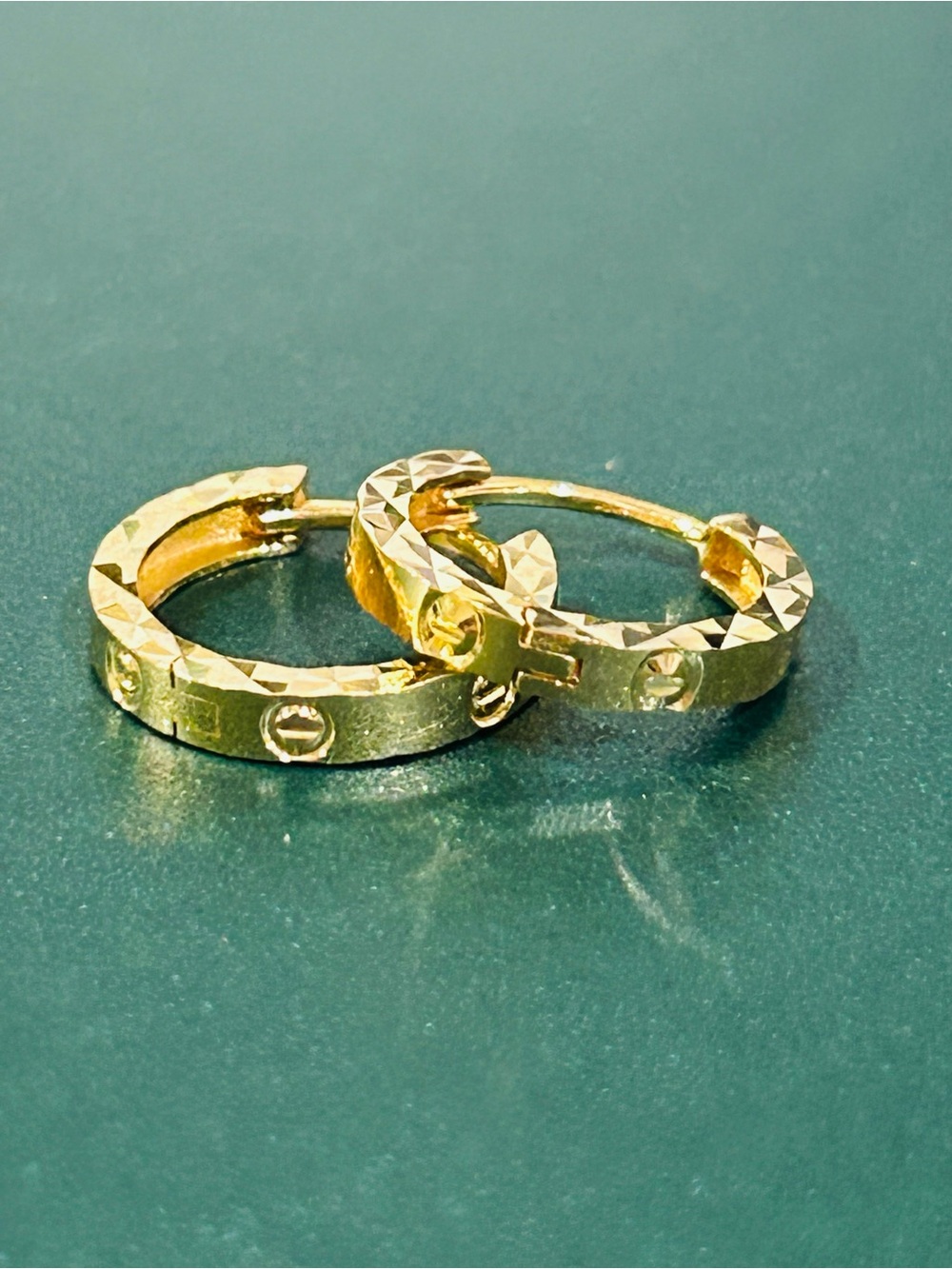 18 Gold Textured Hoop Earrings with Accent Stones